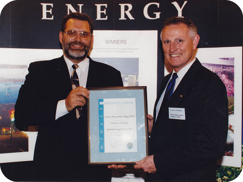 002 Phil Bianchi and Dr John OSullivan receiving the Commercial Buildings Energy Award 1995